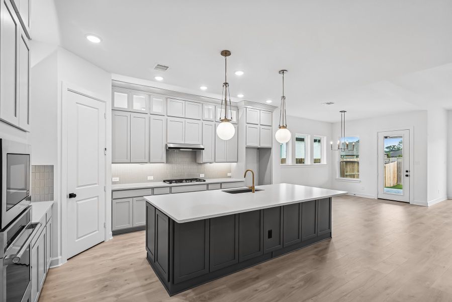 Furnished interior view inside a new home in The Highlands 55' - Encore Collection, Porter (Image 6).