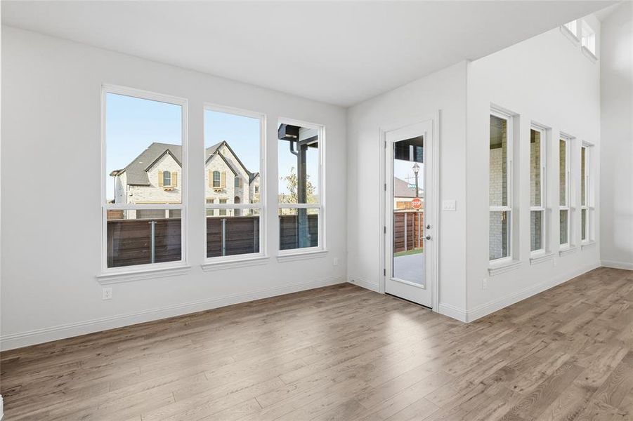 Empty room featuring hardwood / wood-style floors