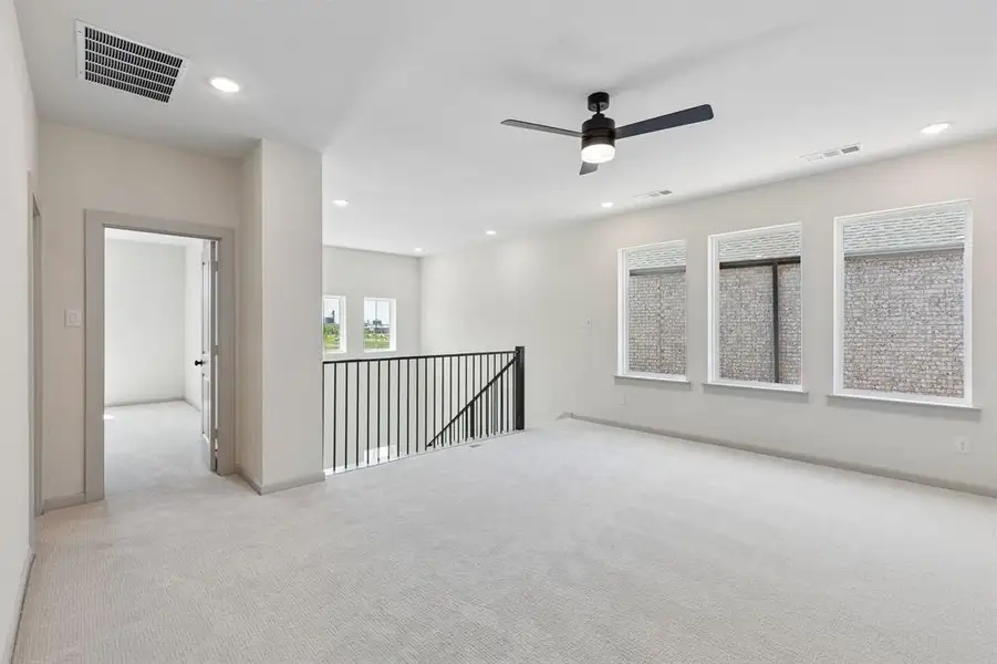 The spacious game room in our Bella plan provides the perfect place to host those big game day parties or family game night! The spacious game room in our Bella plan provides the perfect place to host those big game day parties or family game night!