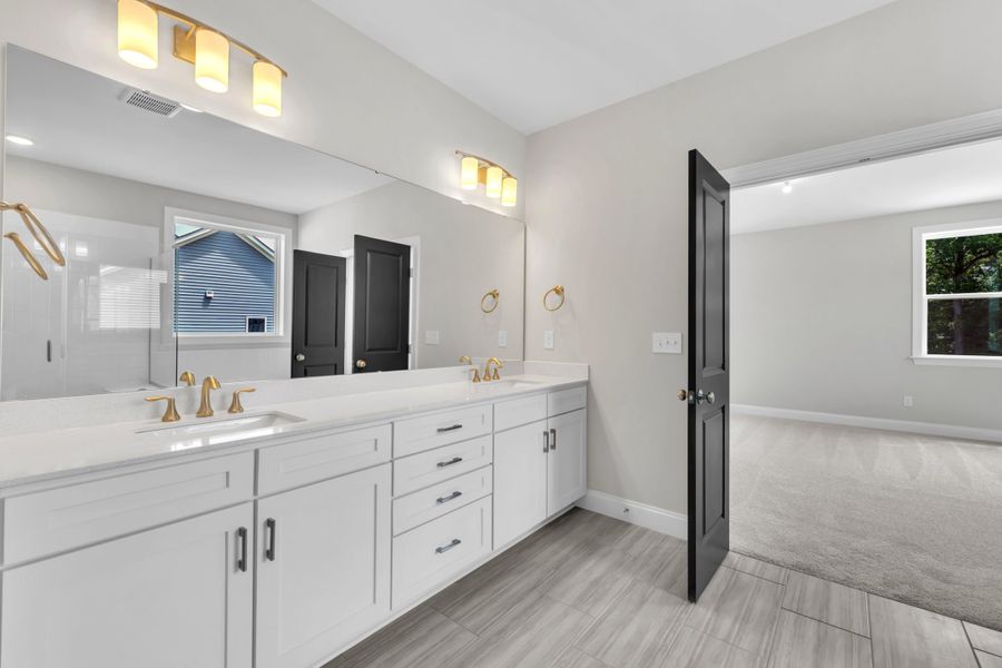 Representative furnished interior of a home built from the The Hampton by RobuckHomes in Kennebec Crossing, Angier (Image 67). Representative furnished interior of a home built from the The Hampton by RobuckHomes in Kennebec Crossing, Angier (Image 67).