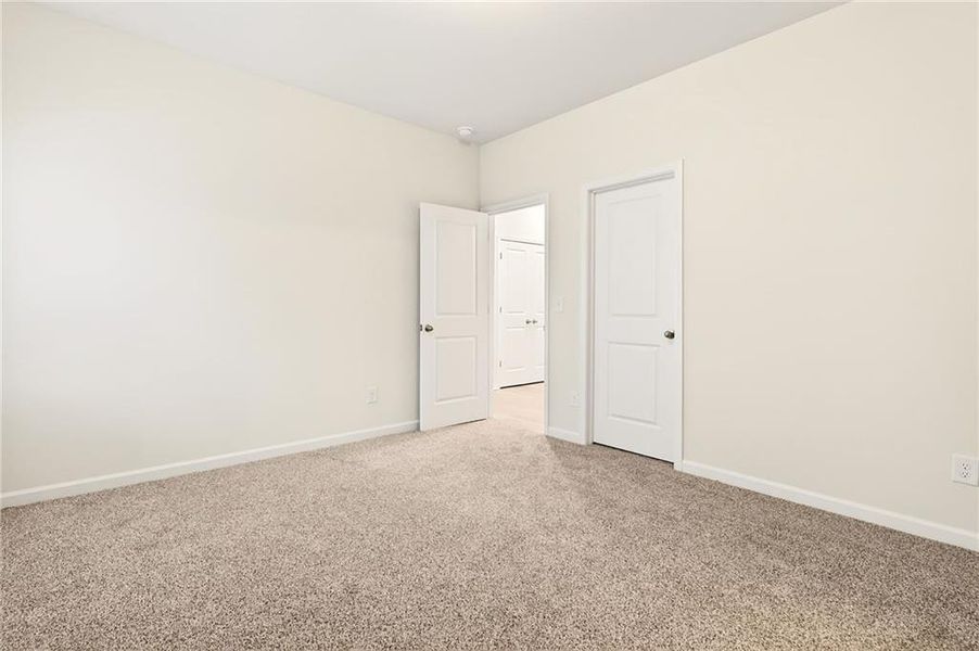 Spacious, unfurnished interior of a new home in River Rock, Ball Ground (Image 28).