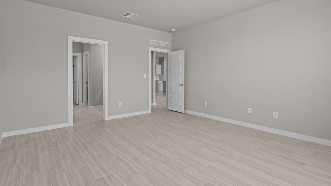 Representative unfurnished interior of a home built from the Southhaven by D.R. Horton in Legacy South, Midland (Image 13).