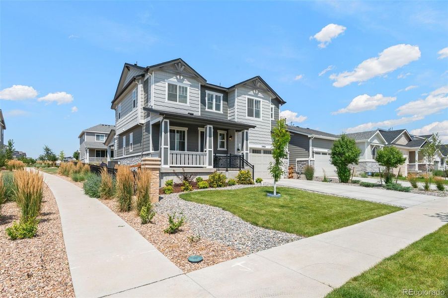 Front exterior of a new home in , Aurora, CO, highlighting curb appeal (Image 2).