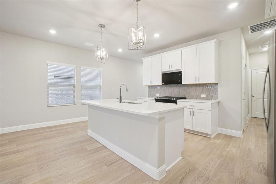 Furnished interior view inside a new home in Parks at Foster Crossing - Spring Series, Anna (Image 12).