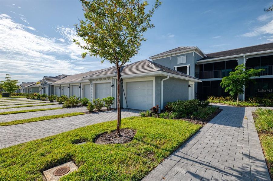 Front exterior of a new home in , Venice, FL, highlighting curb appeal (Image 24). Front exterior of a new home in , Venice, FL, highlighting curb appeal (Image 24).