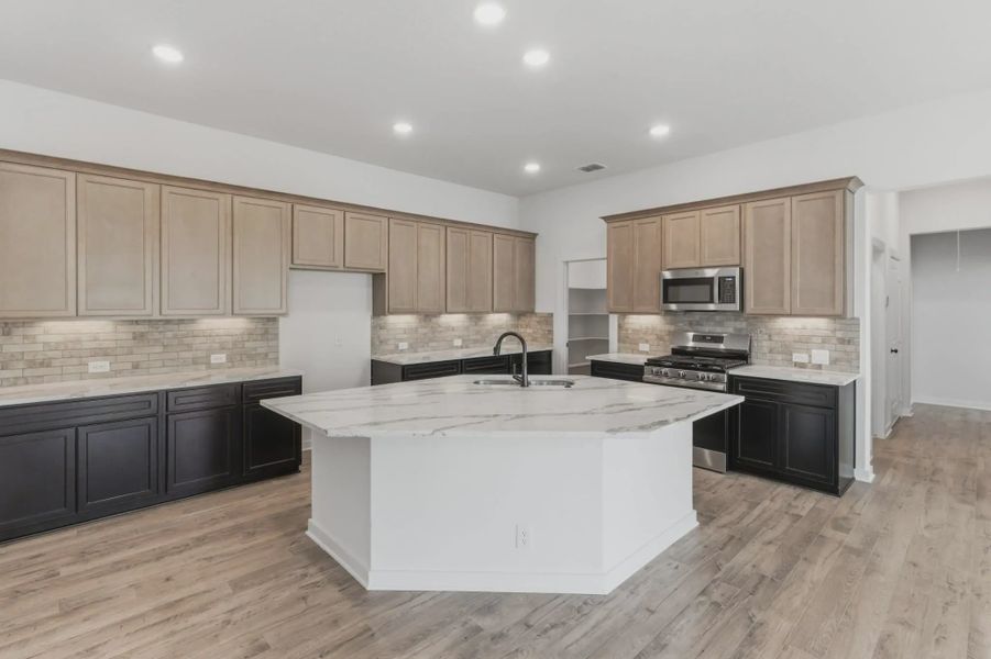Representative furnished interior of a home built from the Sacha by Chesmar Homes in The Crossvine, Forney (Image 3).
