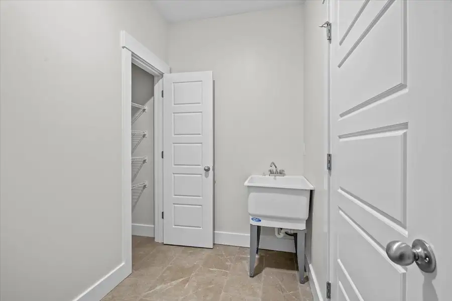 Representative furnished interior of a home built from the Caterina Elite by Enchanted Homes in Smokey Hills, Campobello (Image 18).