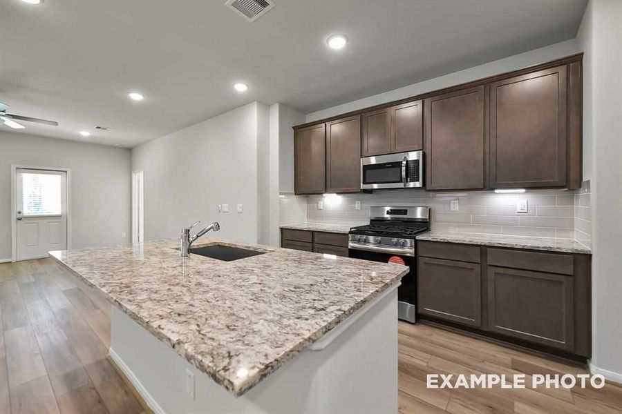 Furnished interior view inside a new home in Lakes at Black Oak, Magnolia (Image 9).