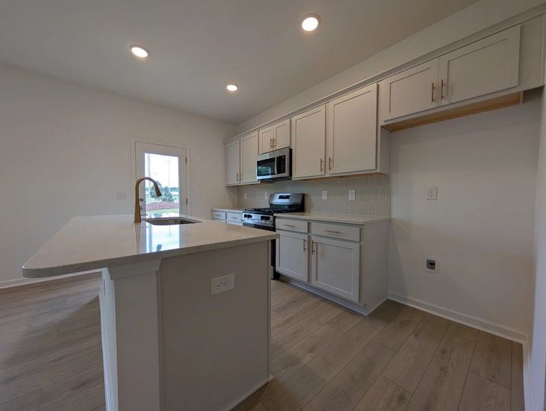 Furnished interior view inside a new home in Towns at The Point, Rolesville (Image 4).