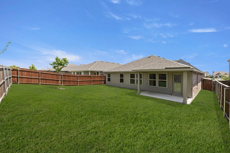 Front exterior of a new home in De Berry Reserve, Royse City, TX, highlighting curb appeal (Image 26). Front exterior of a new home in De Berry Reserve, Royse City, TX, highlighting curb appeal (Image 26).