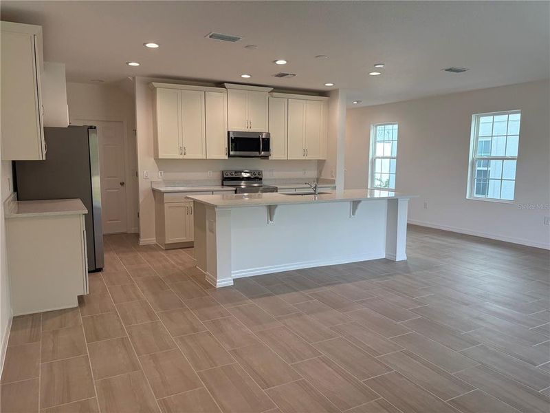 Furnished interior view inside a new home in Sky Lakes Towns, St. Cloud (Image 7).