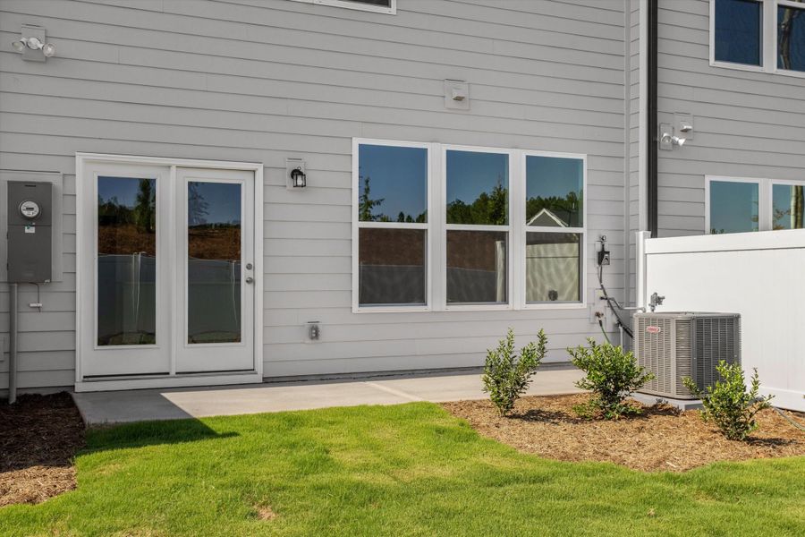 Exterior details and patio area of a home in Sweetbrier, Durham (Image 4).