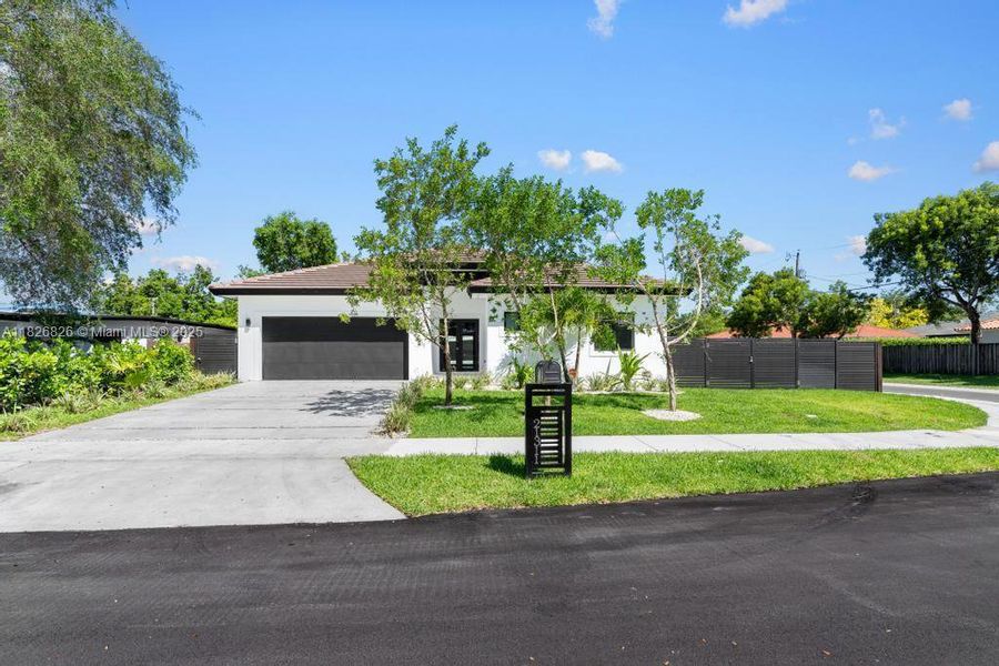 Front exterior of a new home in , Cutler Bay, FL, highlighting curb appeal (Image 17).
