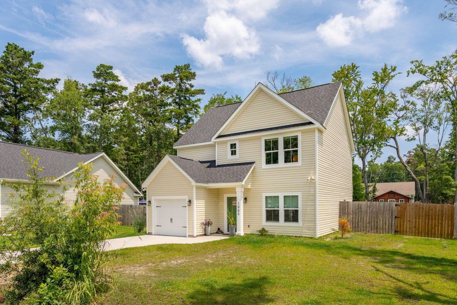 Front exterior of a new home in , Johns Island, SC, highlighting curb appeal (Image 25). Front exterior of a new home in , Johns Island, SC, highlighting curb appeal (Image 25).