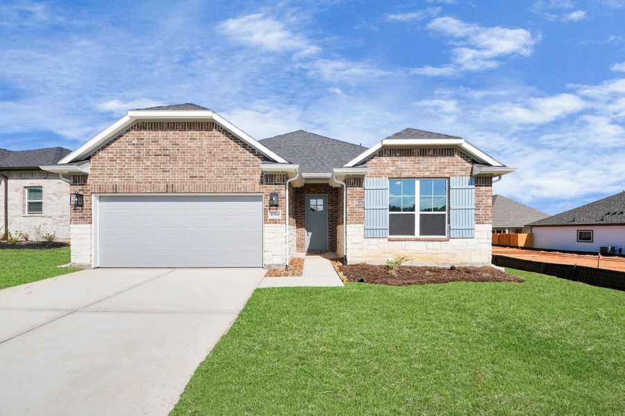 Front exterior of a new home in Lexington Heights, Willis, TX, highlighting curb appeal (Image 24).