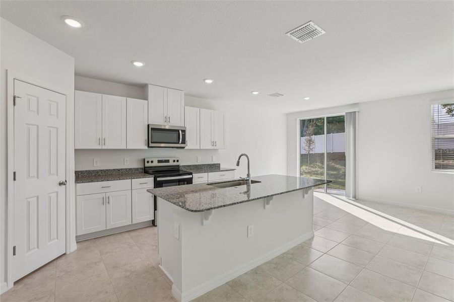 Furnished interior view inside a new home in Deer Run at Crosswinds, Davenport (Image 16). Furnished interior view inside a new home in Deer Run at Crosswinds, Davenport (Image 16).