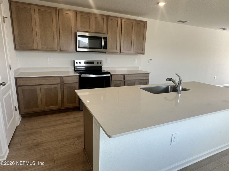 Furnished interior view inside a new home in Rookery, Green Cove Springs (Image 14).
