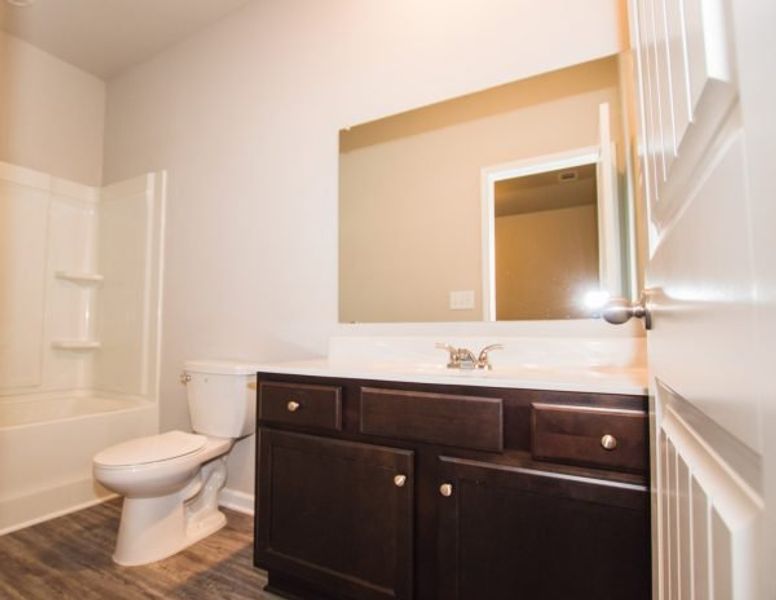 Representative furnished interior of a home built from the Cadence Unit B by Piedmont Residential in Ross Pointe, Kennesaw (Image 11).