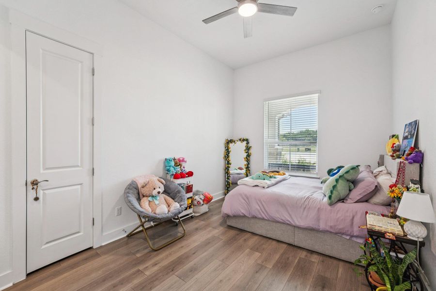 Hardwood flooring and neutral tones provide a timeless foundation for any design style.