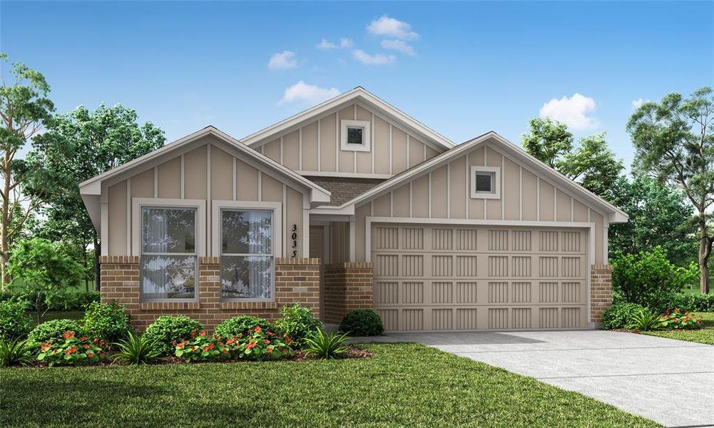 View of front facade featuring a garage and a front yard