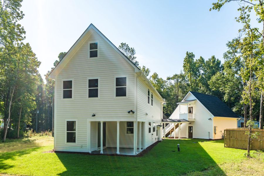 Exterior details and patio area of a home in , Johns Island (Image 26).