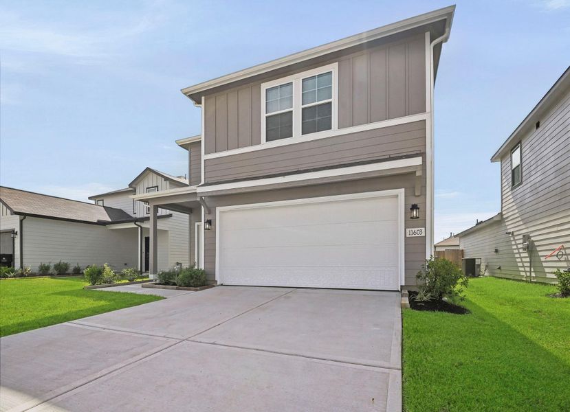 Front exterior of a new home in Barrett Crossing, Crosby, TX, highlighting curb appeal (Image 17).