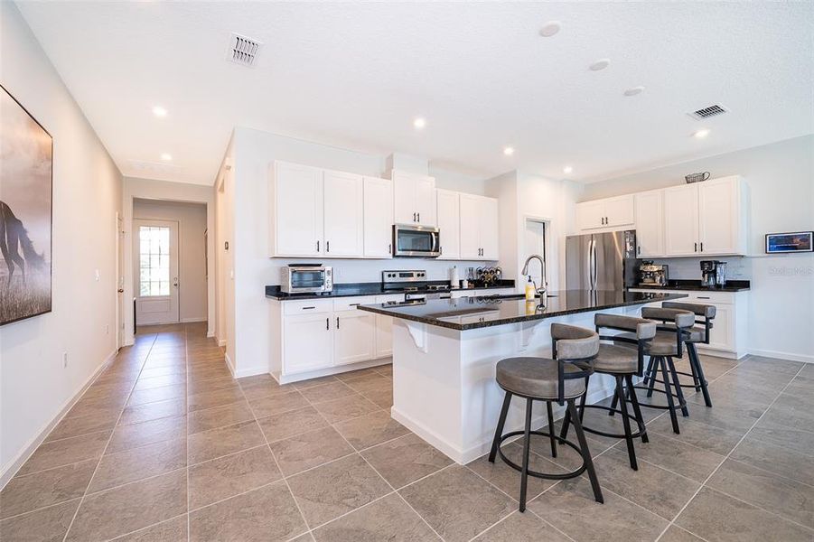Furnished interior view inside a new home in , Kissimmee (Image 12).
