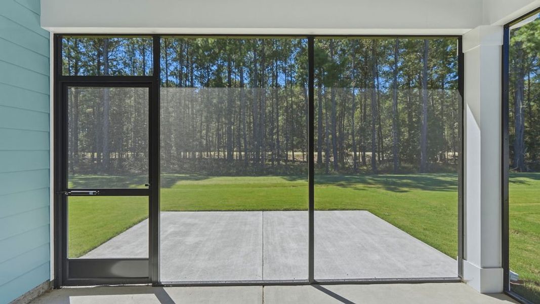 Exterior details and patio area of a home in Sun City Hilton Head, Bluffton (Image 24).