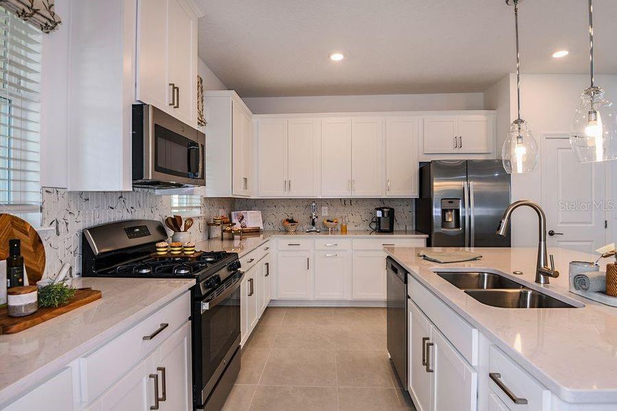 Furnished interior view inside a new home in Harvest at Ovation, Winter Garden (Image 10).