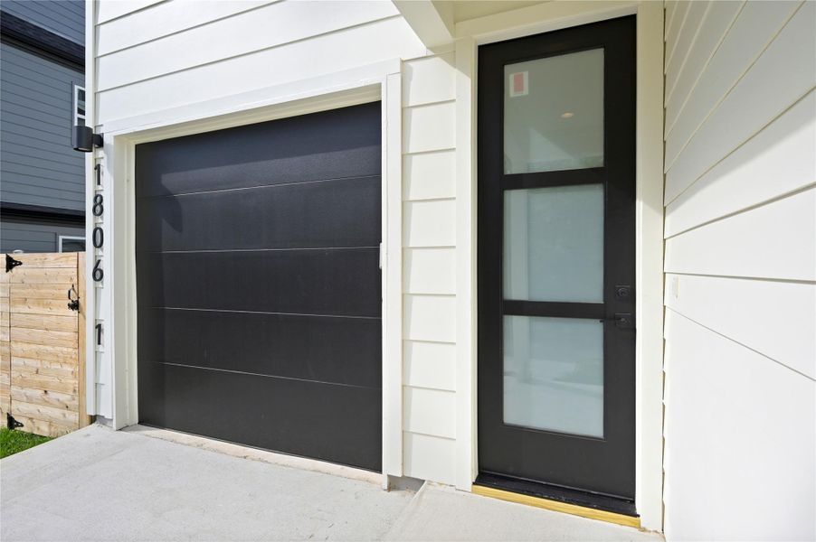Doorway to property featuring a garage Doorway to property featuring a garage
