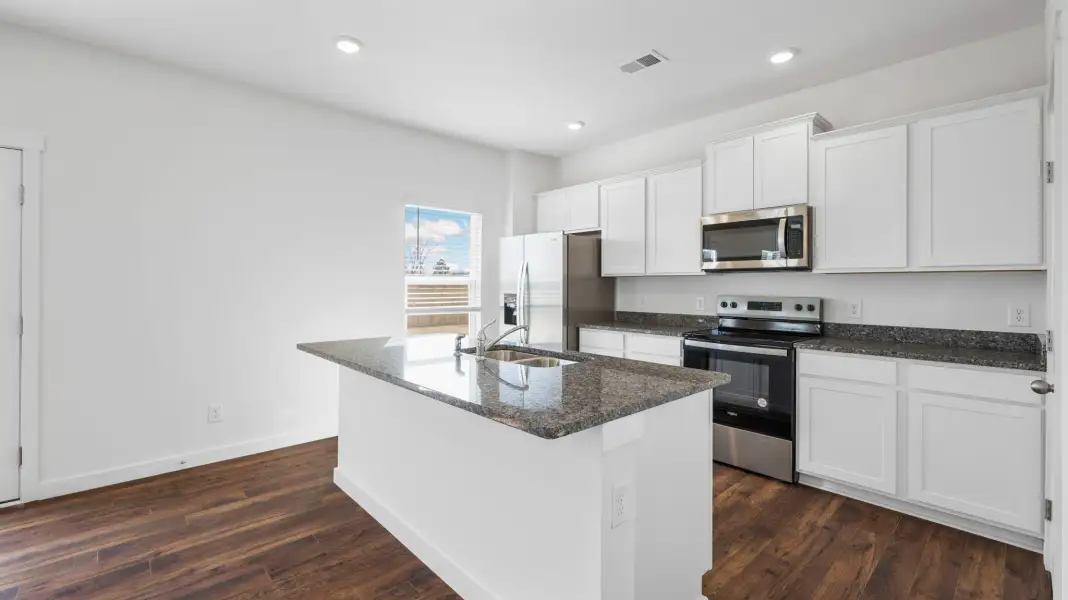 Furnished interior view inside a new home in Lone Oaks Farm, Cleveland (Image 4).