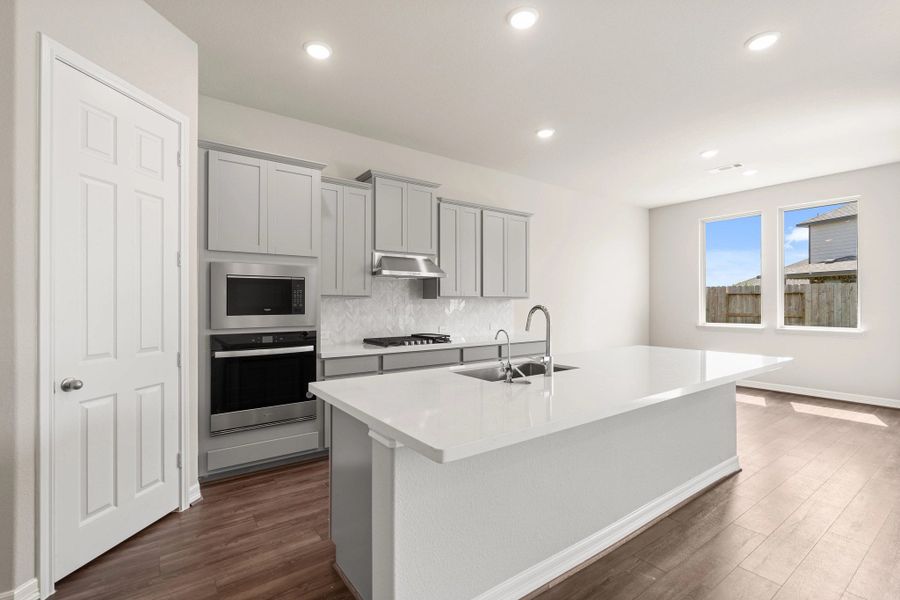 Furnished interior view inside a new home in Sunterra Lakes, Brookshire (Image 3).