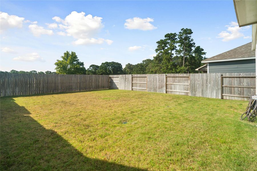 Exterior details and patio area of a home in , Conroe (Image 3). Exterior details and patio area of a home in , Conroe (Image 3).