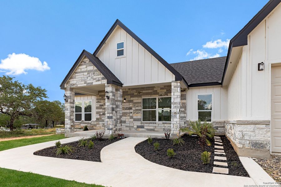 Front exterior of a new home in , Lytle, TX, highlighting curb appeal (Image 25). Front exterior of a new home in , Lytle, TX, highlighting curb appeal (Image 25).