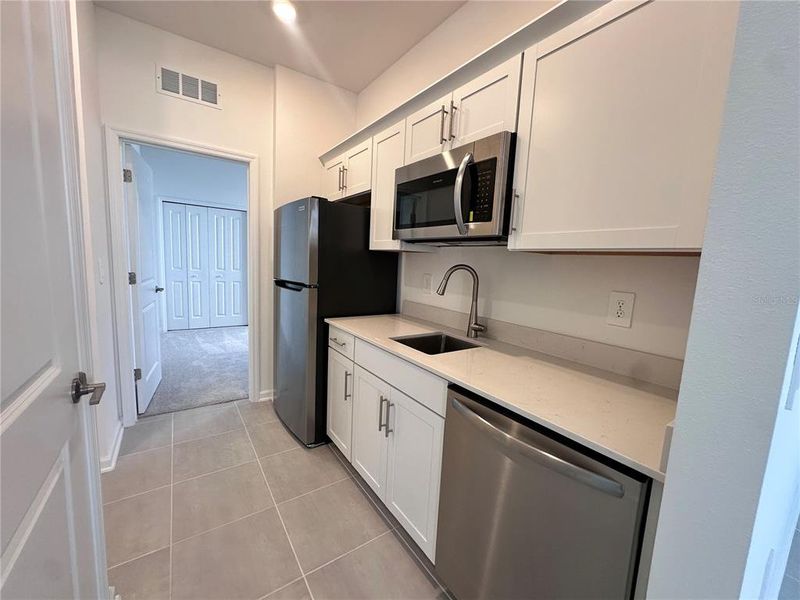 Furnished interior view inside a new home in Bridgewalk, St. Cloud (Image 4).