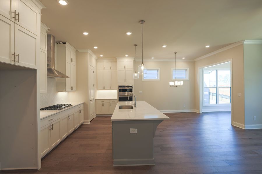 Representative furnished interior of a home built from the The Bennett by The Providence Group in Aberdeen, Hoschton (Image 6).