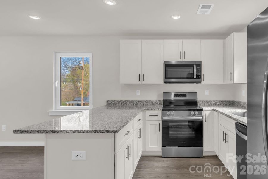 Furnished interior view inside a new home in , Statesville (Image 9).