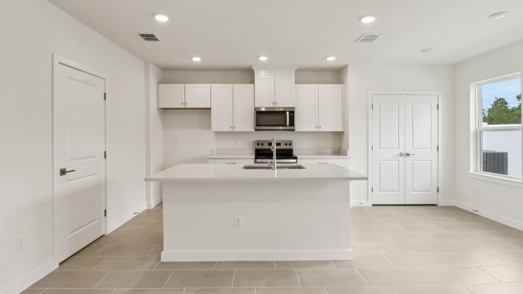 Representative furnished interior of a home built from the Carmel - Interior by DRB Homes in Cyrene at Harmony, St. Cloud (Image 7). Representative furnished interior of a home built from the Carmel - Interior by DRB Homes in Cyrene at Harmony, St. Cloud (Image 7).