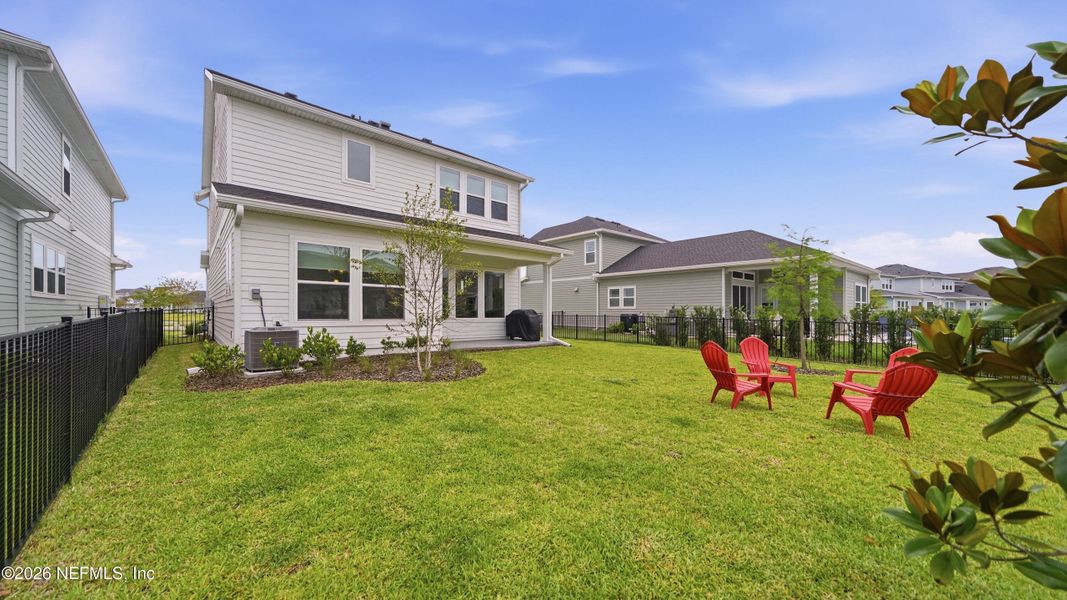 Exterior details and patio area of a home in Seven Pines 40' Front Entry, Jacksonville (Image 4).