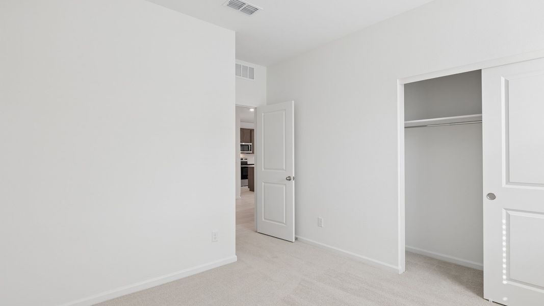 Spacious, unfurnished interior of a new home in Copper Falls, Buckeye (Image 22).