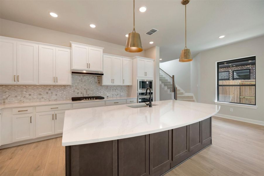 Furnished interior view inside a new home in Sienna - Grove Collection, Missouri City (Image 9).