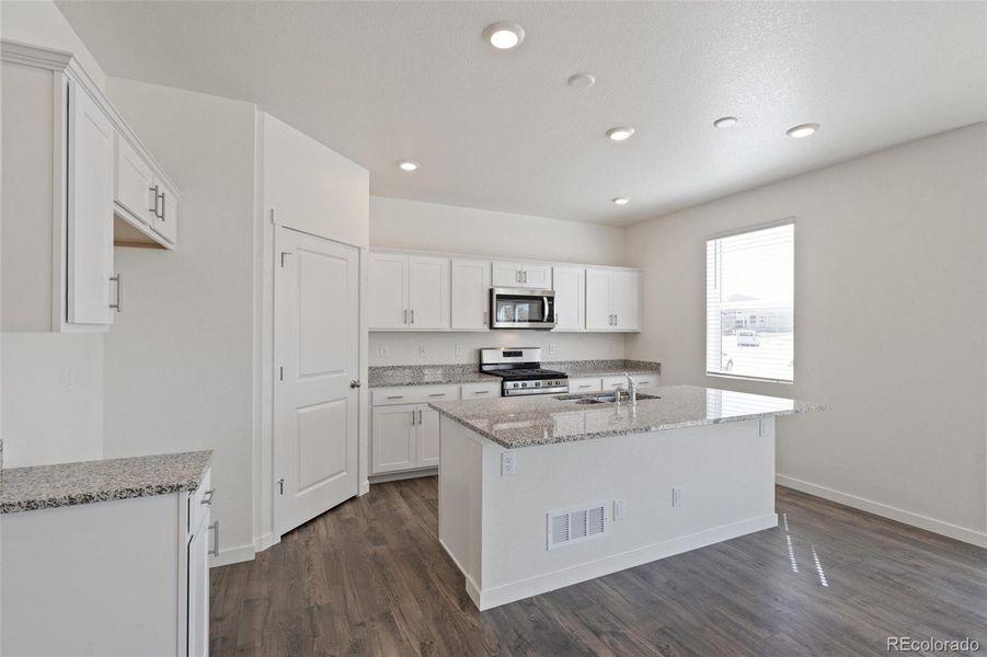 Furnished interior view inside a new home in Trails at Crowfoot, Parker (Image 9).