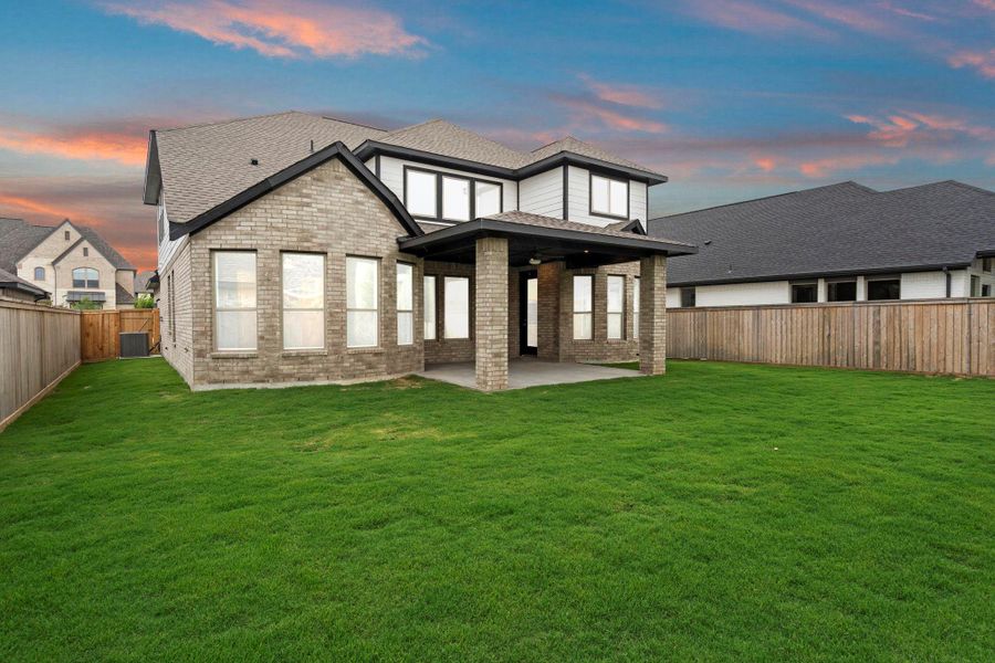 Exterior details and patio area of a home in Bridgeland, Cypress (Image 3). Exterior details and patio area of a home in Bridgeland, Cypress (Image 3).