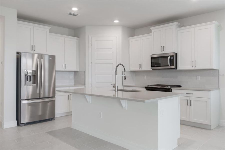 Furnished interior view inside a new home in Lakes of Mount Dora, Mount Dora (Image 6).