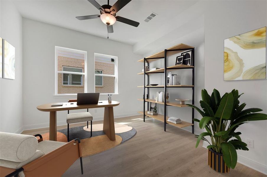 Office space featuring light wood-style flooring and ceiling fan