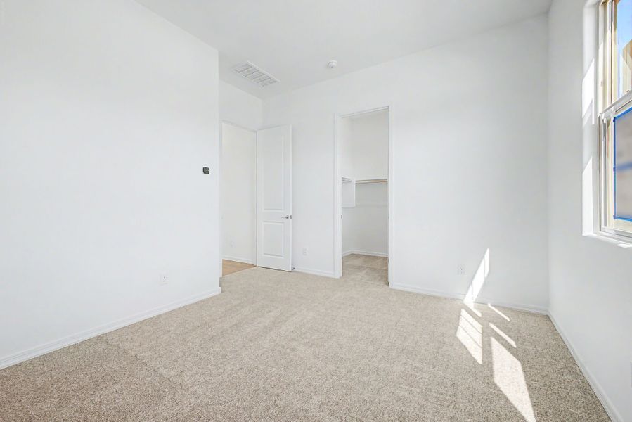Spacious, unfurnished interior of a new home in Empire Pointe, Queen Creek (Image 16).