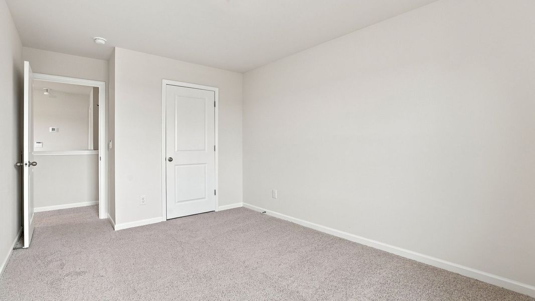 Spacious, unfurnished interior of a new home in Carter Ridge, Greenville (Image 32).
