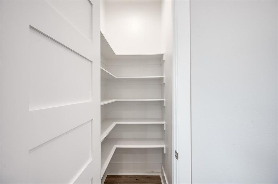 You can stock up with all the extra storage in the walk-in pantry!