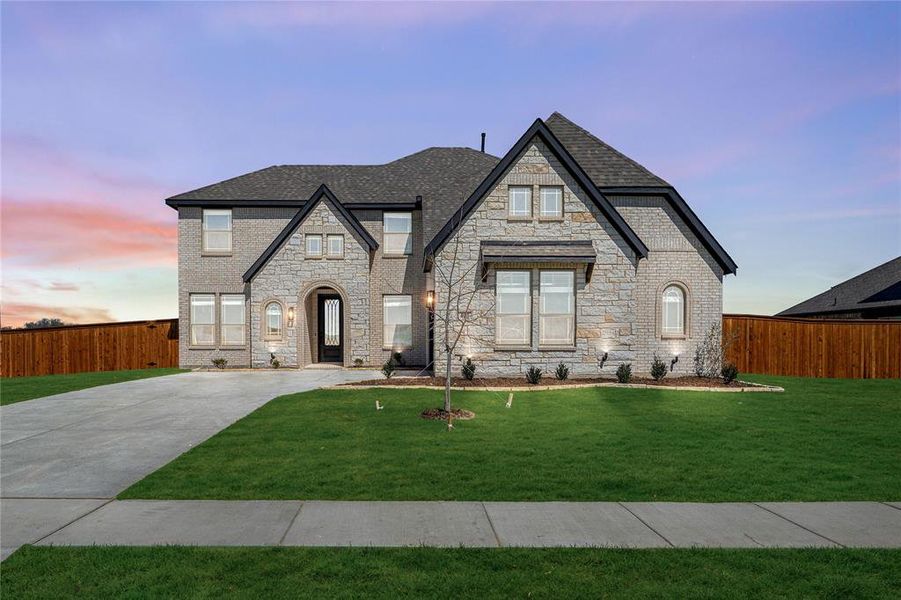 Front exterior of a new home in Glenbrook, Red Oak, TX, highlighting curb appeal (Image 2).