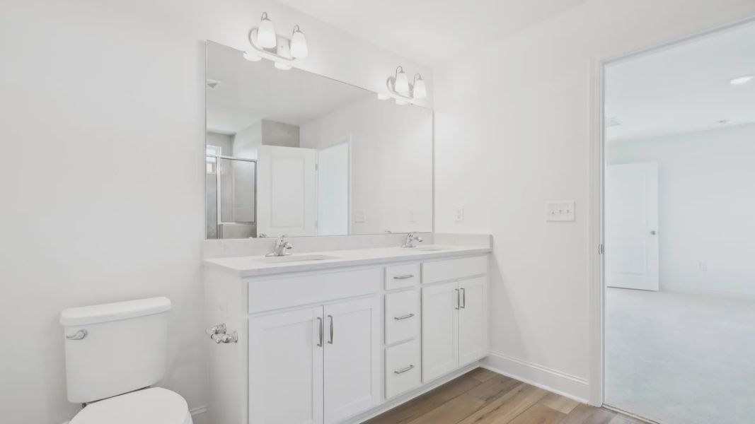 Furnished interior view inside a new home in Sidney Creek Single Family, Zebulon (Image 17).